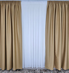 Draperie Tip Hotel Crem Auriu Blackout 98% – ideala pentru livinguri si dormitoare elegante cu canapele crem, bej, cappuccino sau gri deschis si accente aurii, mobilier alb sau lemn natur – confectionata pe comanda