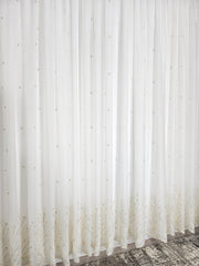 Perdea Eric ivory din material plin ca textura cu flori crem