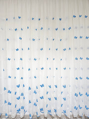 Perdea ieftina, preț avantajos din material plin ca textura tip in cu fluturi albastri