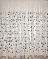 Perdea Esmeralda alb cu verde din material plin ca textura tip in