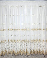 Perdea Reina crem cu broderie aurie material plin ca textura tip in