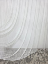 Perdea Iris crem cu sclipici tip spaghete, material plin ca textura