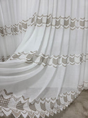 Ideala pentru living si dormitor cu pat sau canapea crem ori bej, pereti albi si mobilier crem sau maro - Perdea Minodora din Material Plin Crem cu Broderie Sparta Crem-Maro - confectionata pe comanda