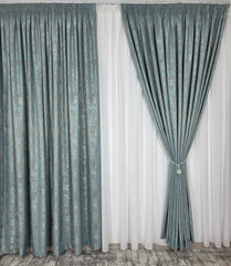 Draperie Venti turcoaz texturată cu aspect de vopsea decorativă