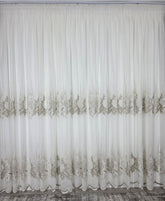 Perdea Idalis crem cu broderie bej cu sidef din material plin ca textura tip in