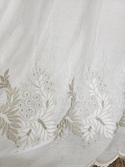 Perdea Idalis crem cu broderie bej cu sidef din material plin ca textura tip in