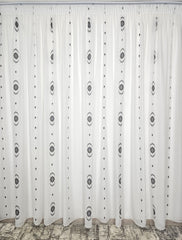 Perdea Romulus alb cu negru din material plin ca textura tip in